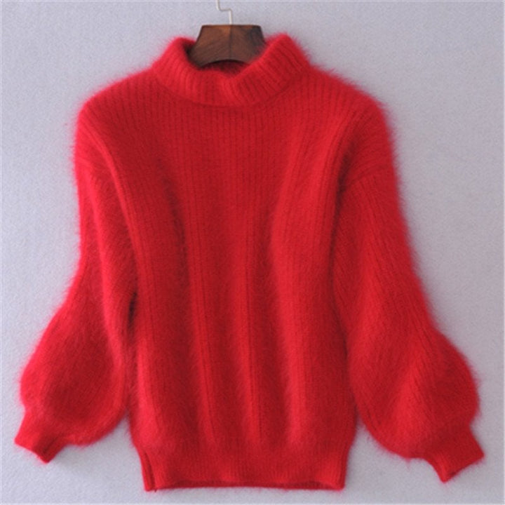 Relaxed fit women's turtleneck sweater, a comfortable and warm long sleeve knit for winter wear.