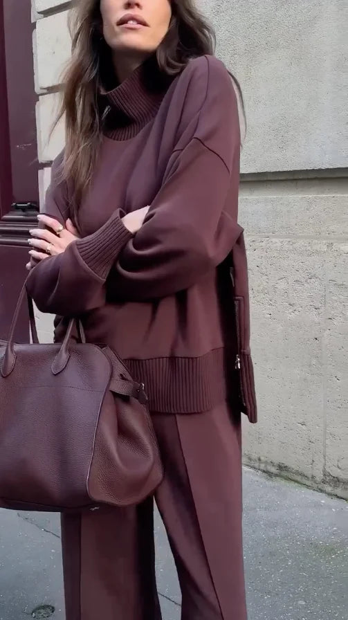 Stylish women's two-piece set featuring a cozy turtleneck sweater and fashionable wide-leg pants.