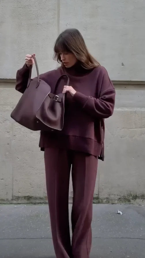 Comfortable women's loungewear set: a warm turtleneck sweater and relaxed wide-leg pants for home or out.