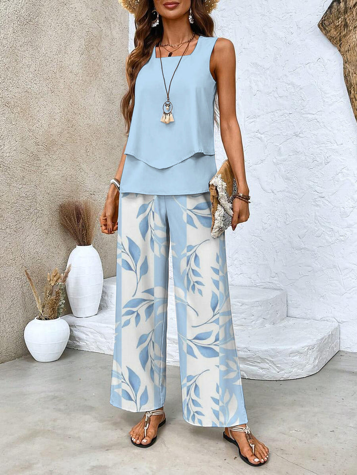 Women's chic two-piece set with a sleeveless top and stylish printed wide-leg trousers for summer fashion.