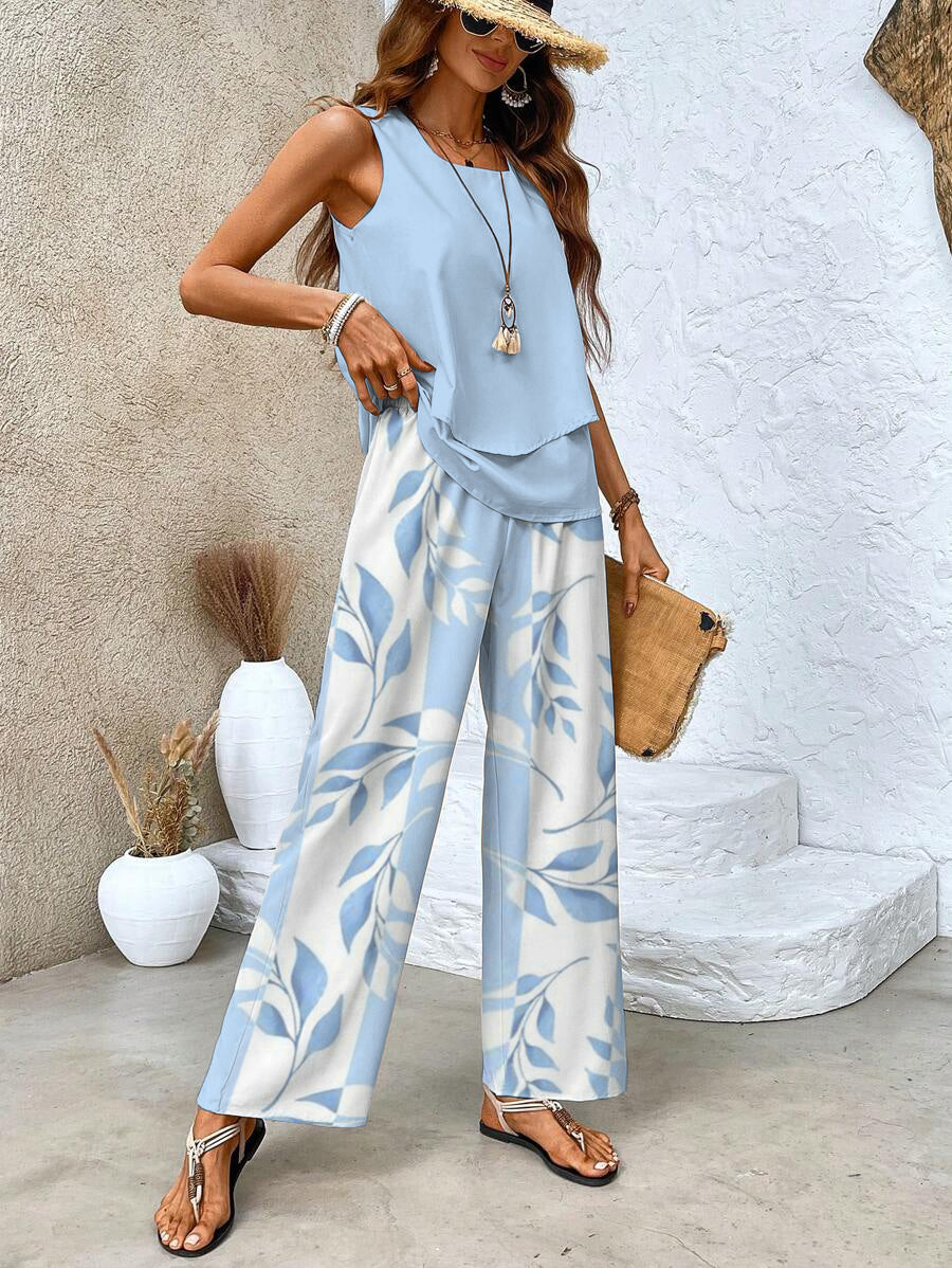 Trendy women's co-ord set featuring a chic sleeveless top and eye-catching printed wide-leg trousers, a complete outfit.