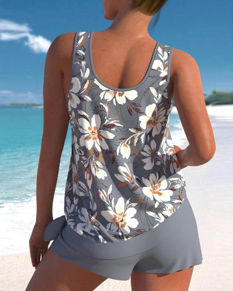 Adjustable women's tankini top with matching comfortable swim bottoms. Stylish two-piece bathing suit.
