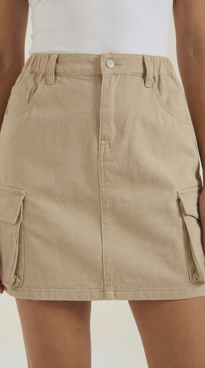 Stylish women's utility cargo mini skirt, versatile for casual or trendy outfits, with convenient pockets.