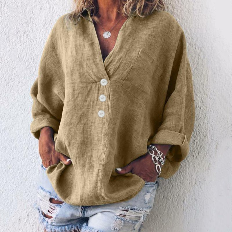 Stylish women's V-neck long sleeve blouse. Oversized button-front top, ideal for chic casual outfits.