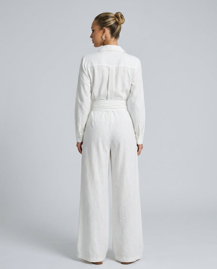 Detailed button-front on a women's chic wide leg jumpsuit, designed for comfort and versatile styling.