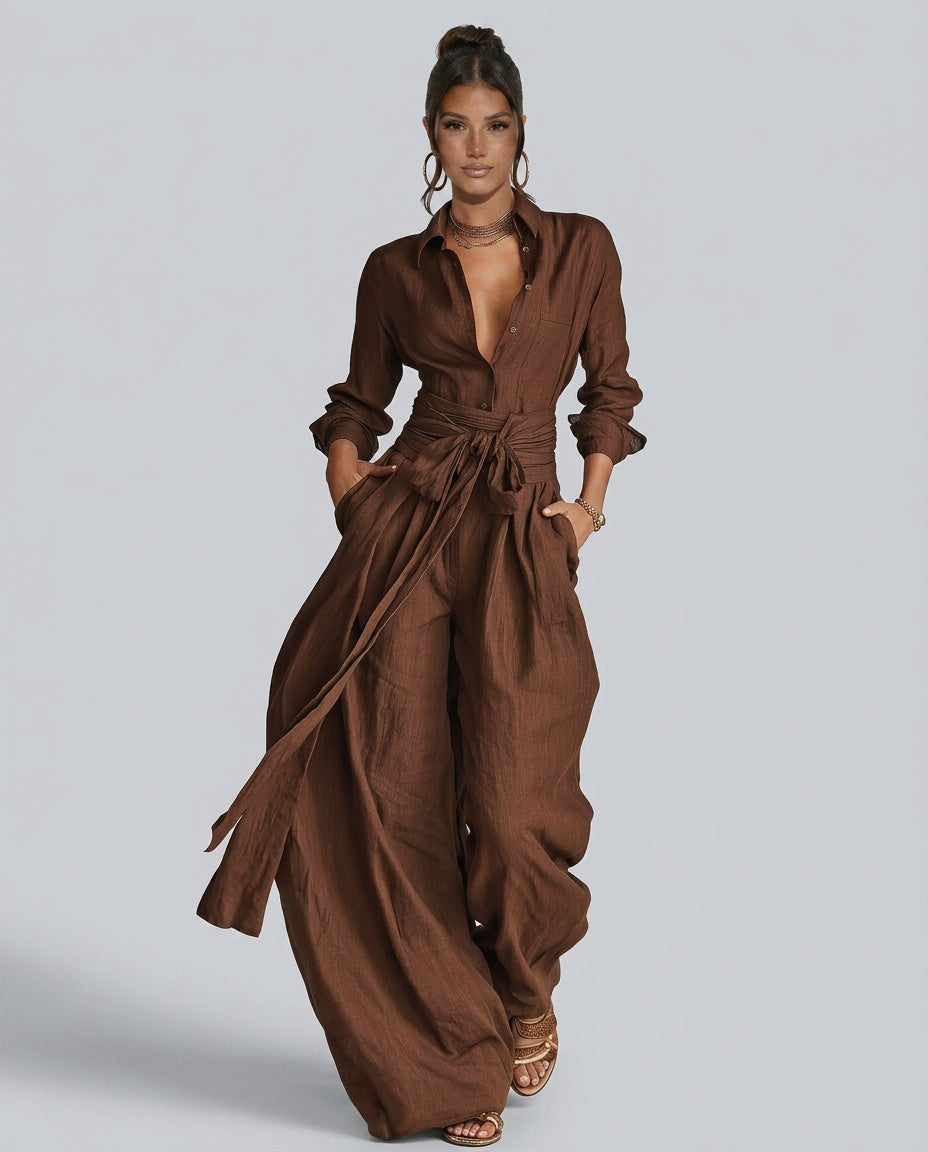 Women's wide leg one-piece jumpsuit with a flattering button front, offering a relaxed and modern silhouette.