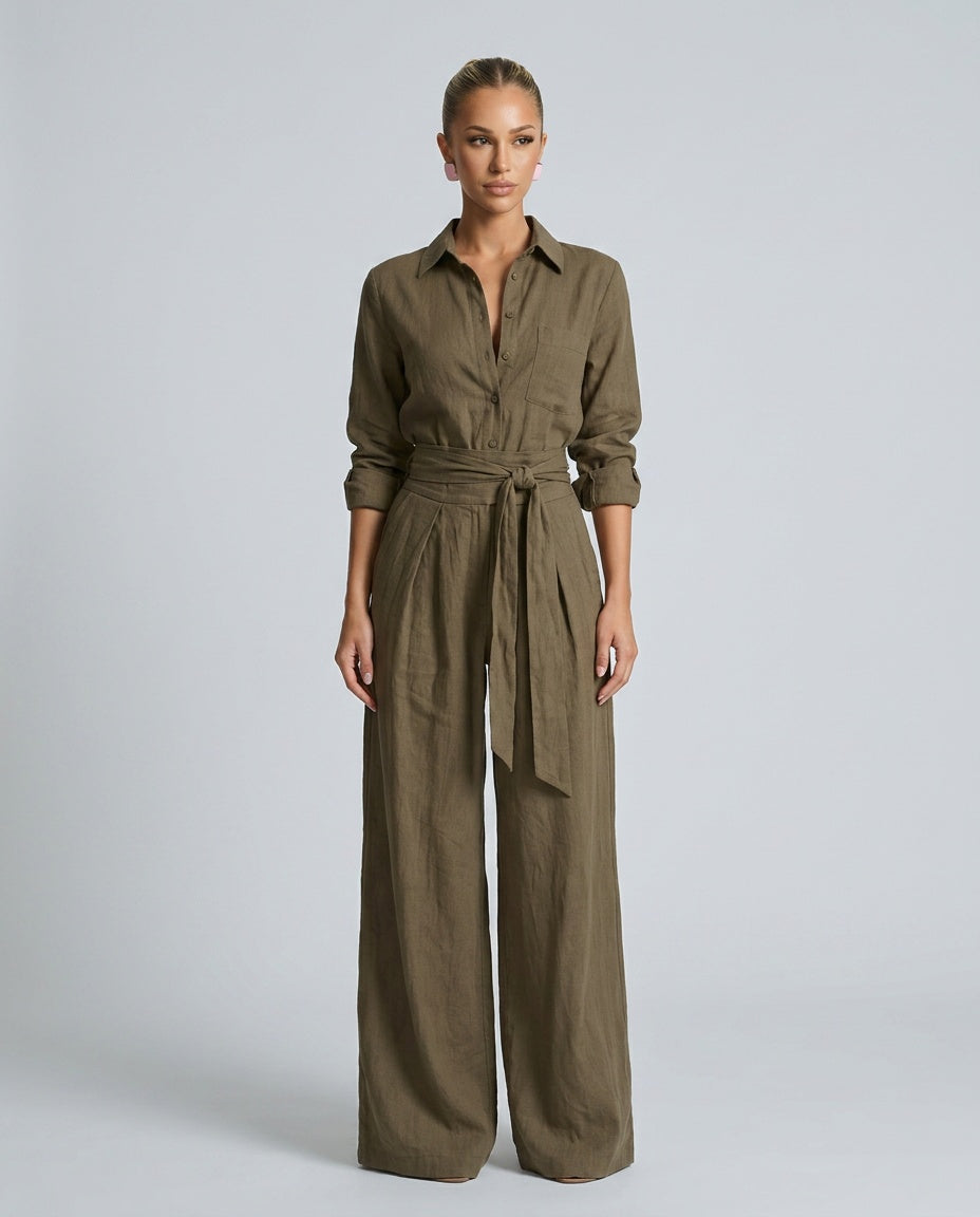 Stylish women's wide leg jumpsuit featuring a practical and chic button-front closure.