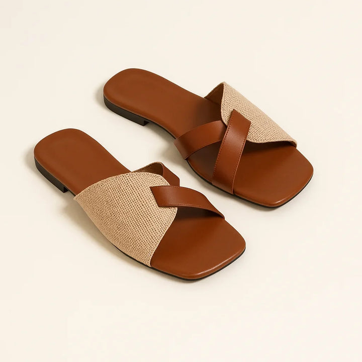 Stylish women's square-toe flat sandals with intricate woven criss-cross straps, ideal for summer fashion and comfort.