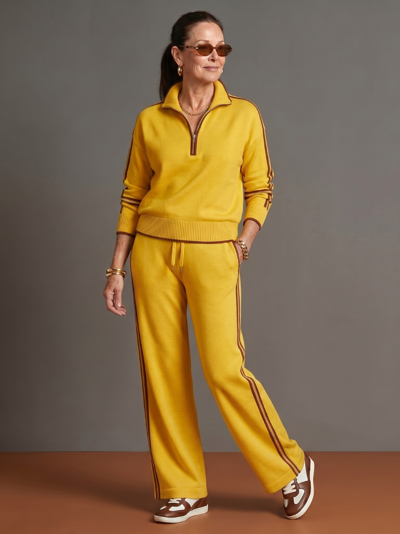 Women's long sleeve zip neck top from a stylish side stripe pants set, perfect for loungewear.