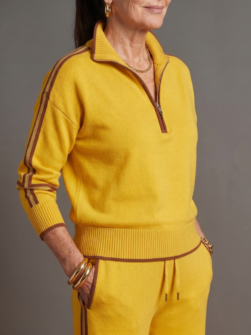 Wide leg pants with a chic side stripe, part of a comfortable women's casual two-piece set.