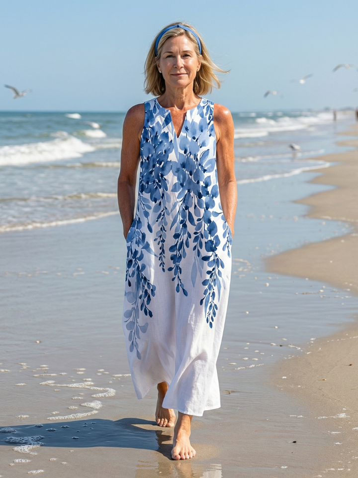 Women's Chill Breeze sleeveless white maxi dress with botanical print. Perfect for summer, beach, or casual wear.