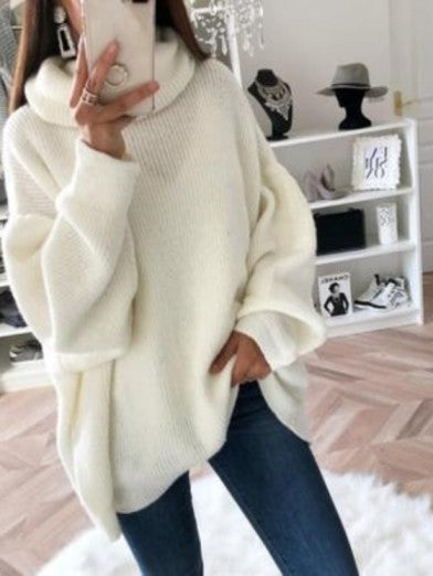 Stylish women's winter essential: a long-sleeved, cozy turtleneck cable knit sweater.