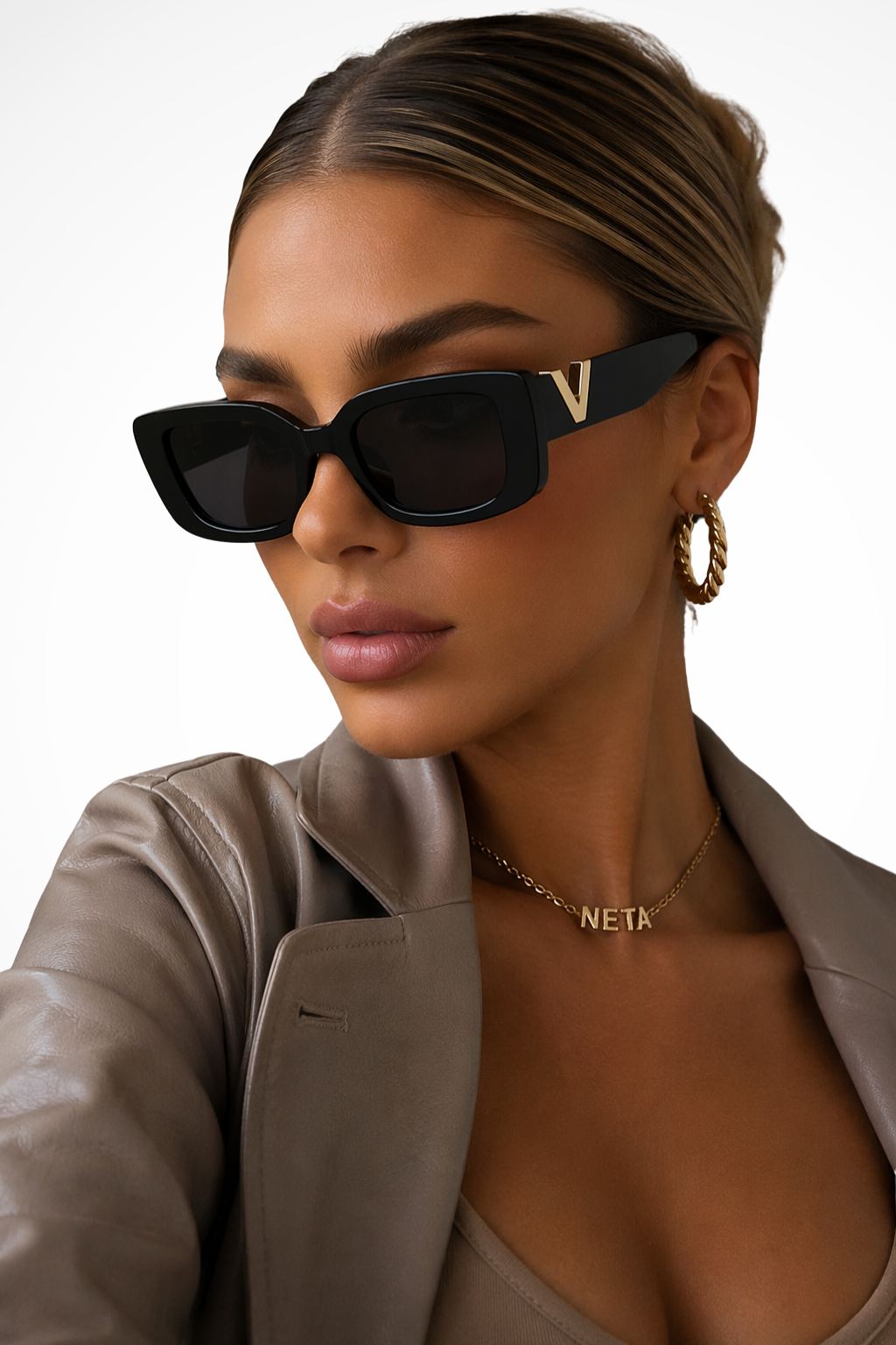 Statement women's chunky cat eye sunglasses, featuring a sophisticated gold V detail; stylish and modern eyewear.