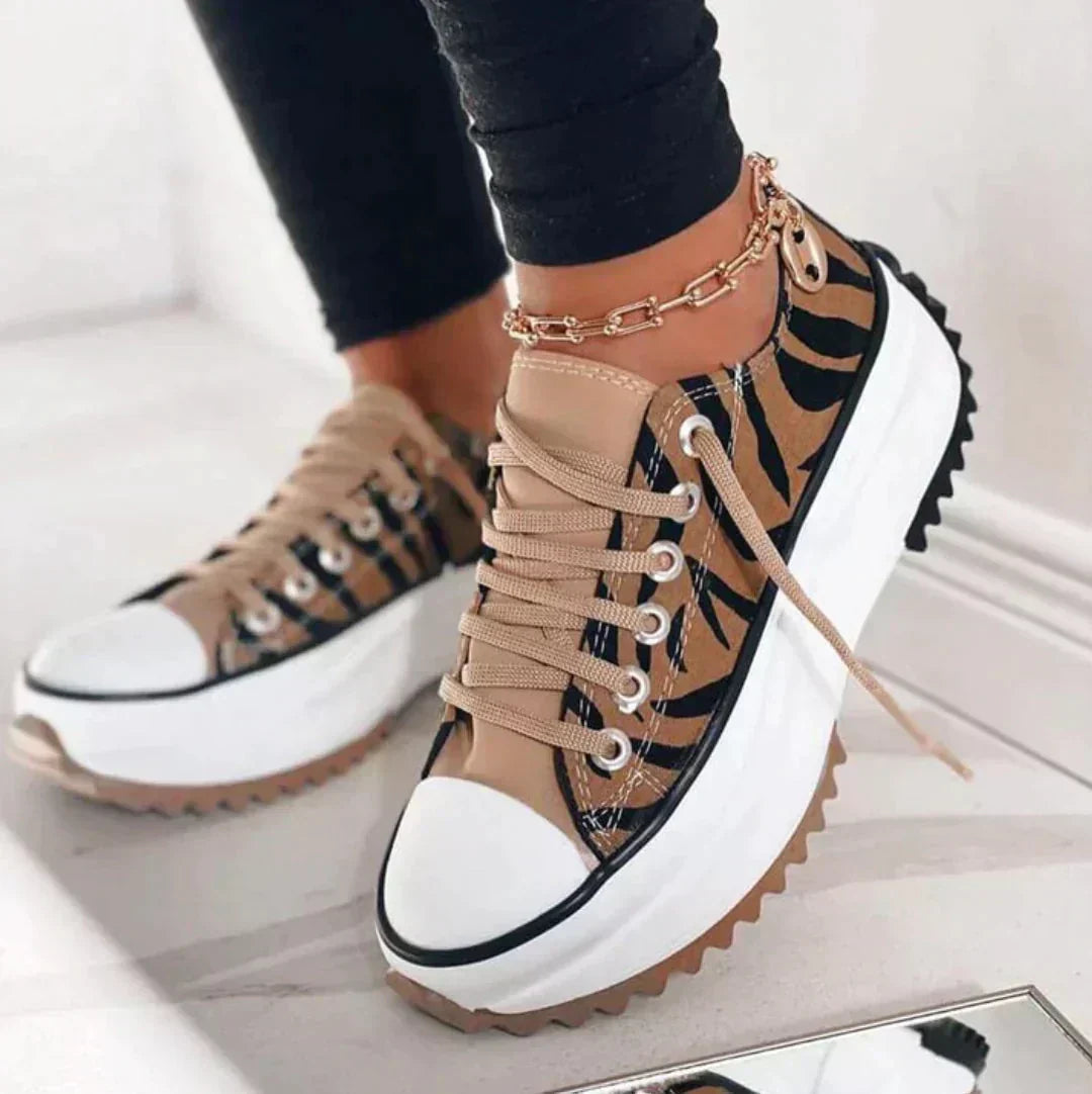 Womens chunky flatform low top sneakers, featuring a comfortable lace-up design for casual & everyday wear.