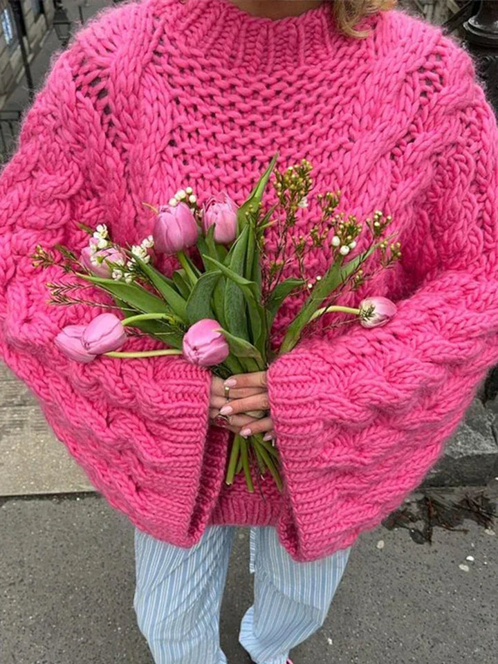 Soft women's chunky knit sweater, oversized and comfy, a long sleeve pullover for cozy casual winter wear.