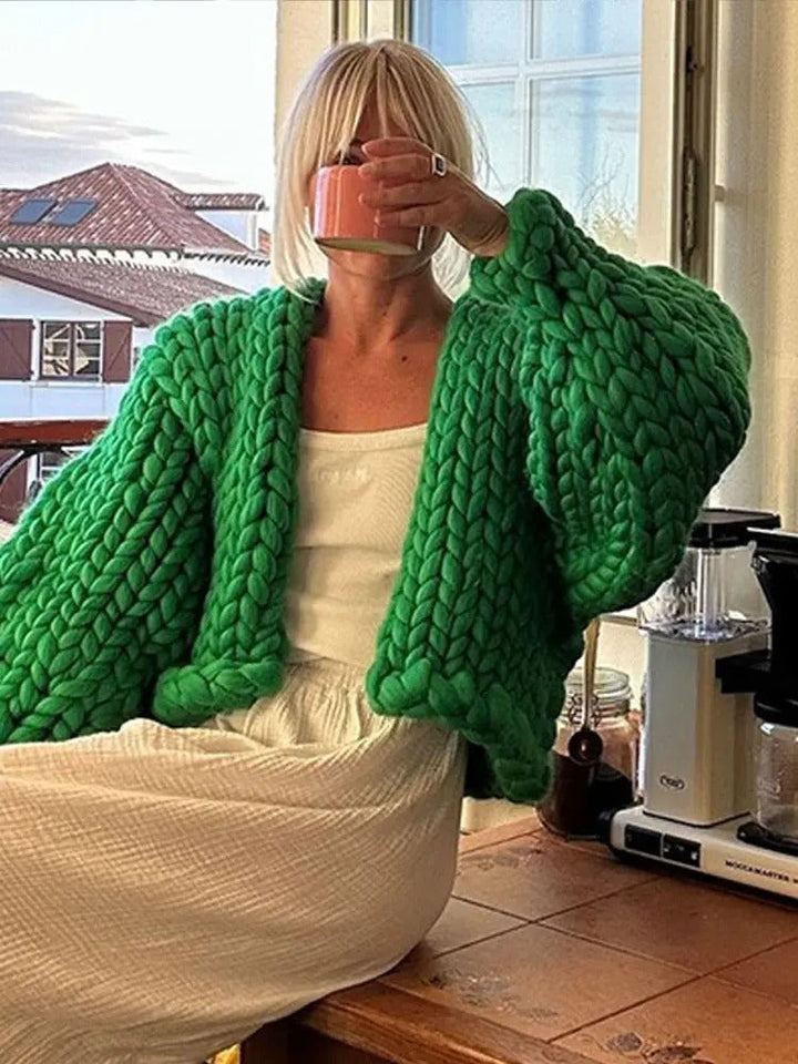 Women's chunky knit V-neck cardigan, loose fit, soft stretch. Perfect cozy fall fashion.