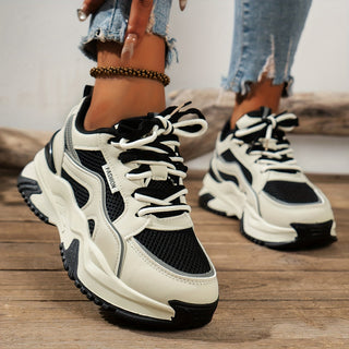 Women's chunky platform panelled sneakers with lace-up front, perfect for a trendy, casual look.