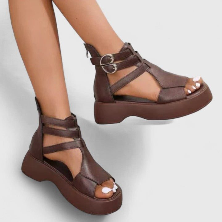 Women's chunky platform sandals with a secure ankle strap, perfect for trendy summer fashion.