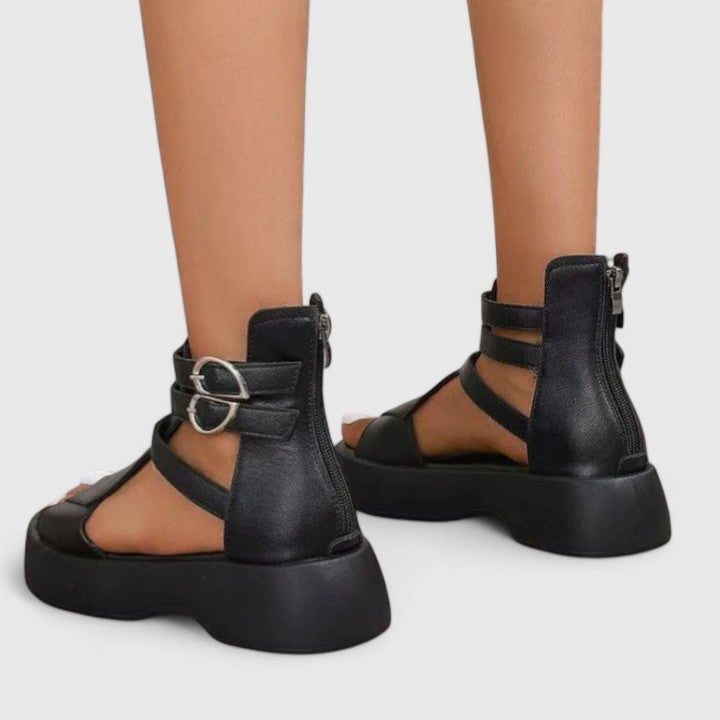 Stylish open-toe women's chunky platform sandals with an adjustable ankle strap for casual summer wear.