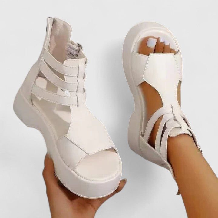 Women's strappy platform sandals, chunky design, and adjustable ankle strap for fashionable summer footwear.