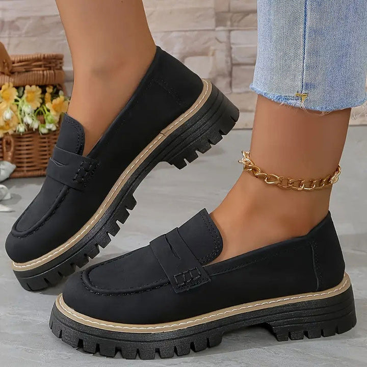Stylish women's chunky sole loafers with vamp strap, a trendy footwear choice for spring & autumn.