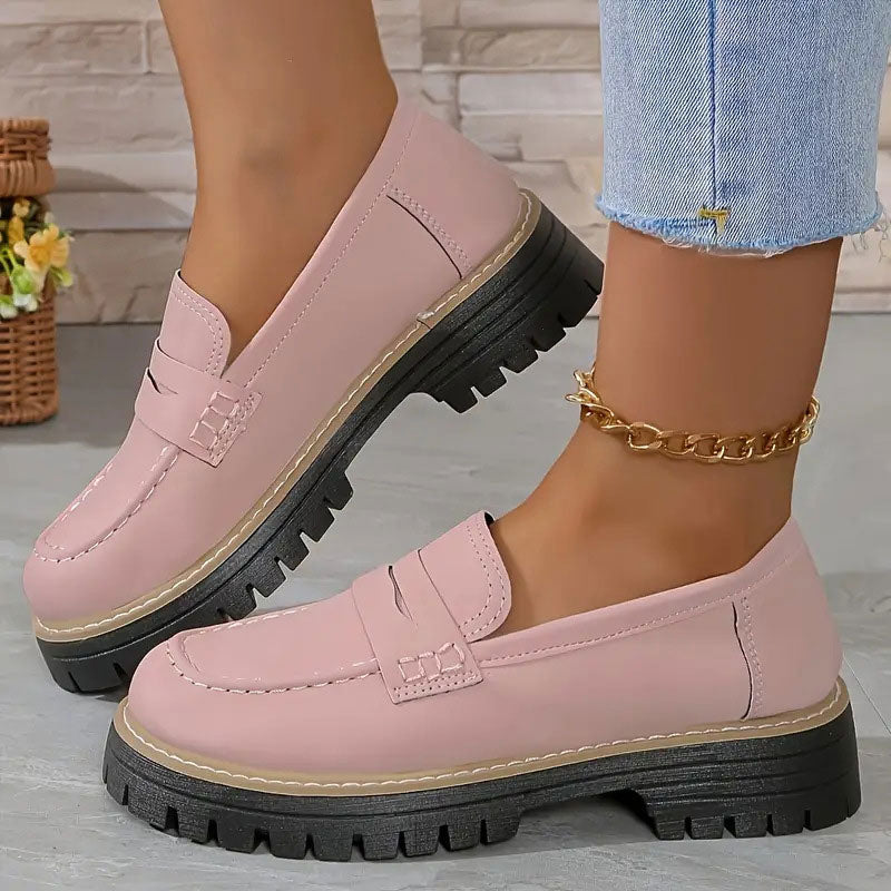 Versatile women's chunky sole loafers; stylish flats with a vamp strap perfect for casual outfits.