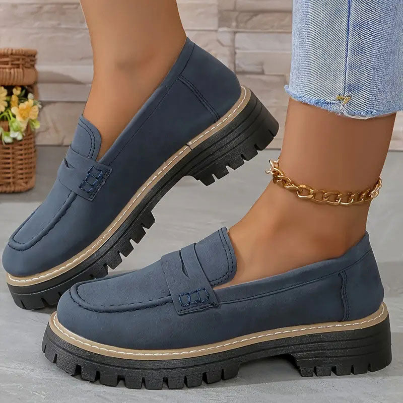 Step out in style with comfortable women's chunky sole loafers, featuring a chic vamp strap design.