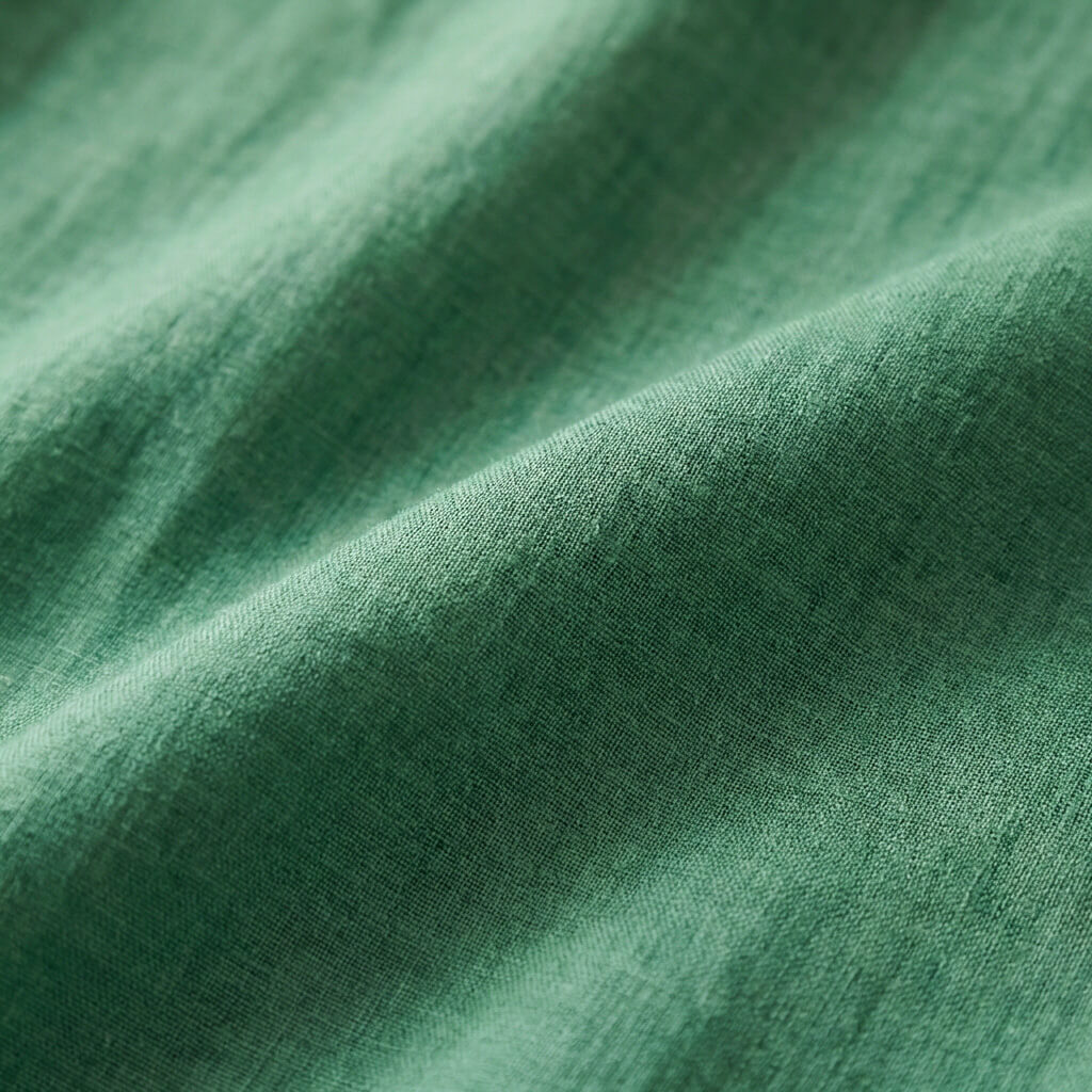 Discover the Clara blouse: a women's linen blend summer top with chic styling.