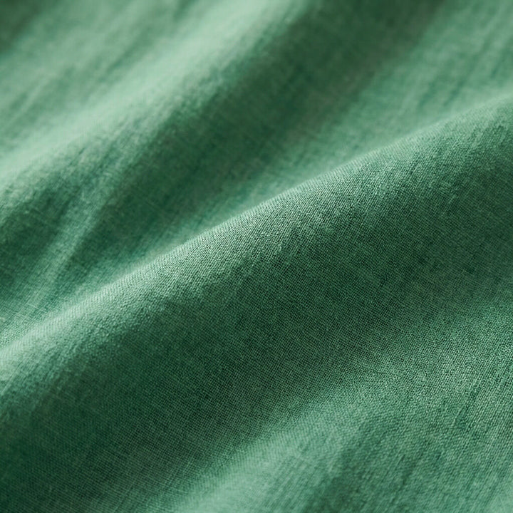 Discover the Clara blouse: a women's linen blend summer top with chic styling.