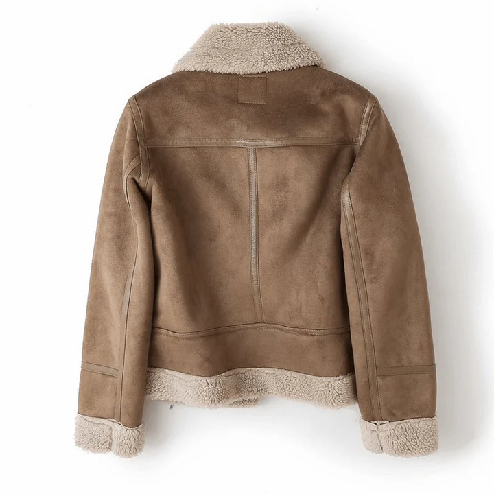 Fashionable woman wearing a classic aviator jacket, a chic and warm women's coat perfect for fall and winter.