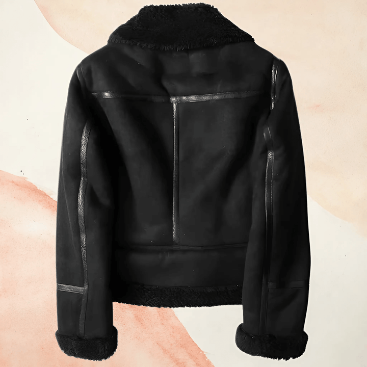 Classic women's aviator jacket with a soft, cozy collar. Versatile & warm, ideal for brisk fall & winter days.