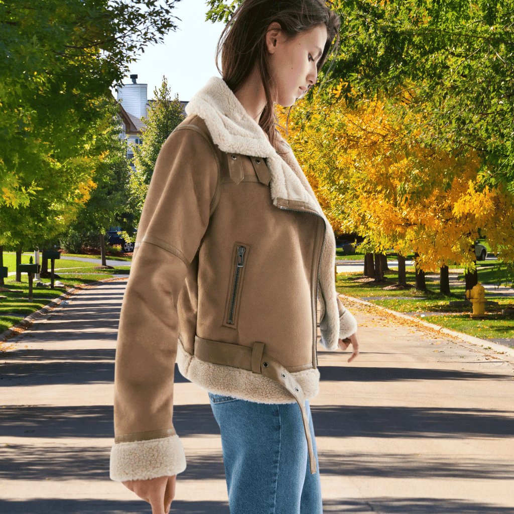 Aviator style women's jacket, a winter essential. Fashionable with a cozy collar & classic appeal.