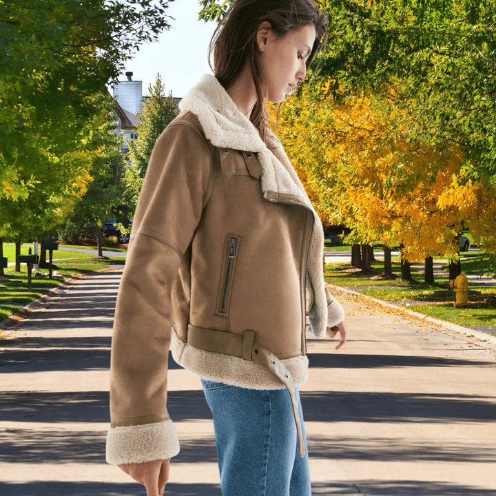 Aviator style women's jacket, a winter essential. Fashionable with a cozy collar & classic appeal.