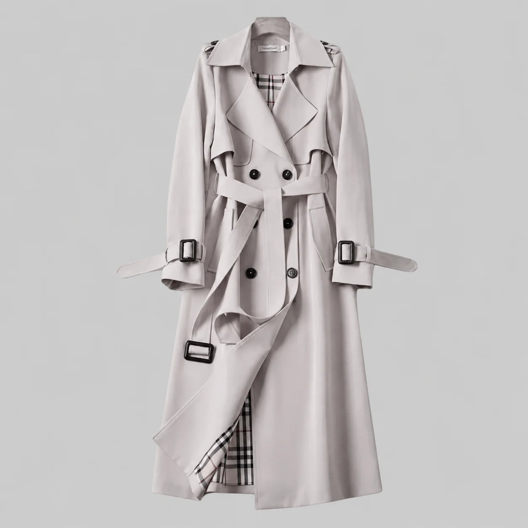 Women's beige double-breasted trench coat, a stylish belted outerwear piece with a classic long design.