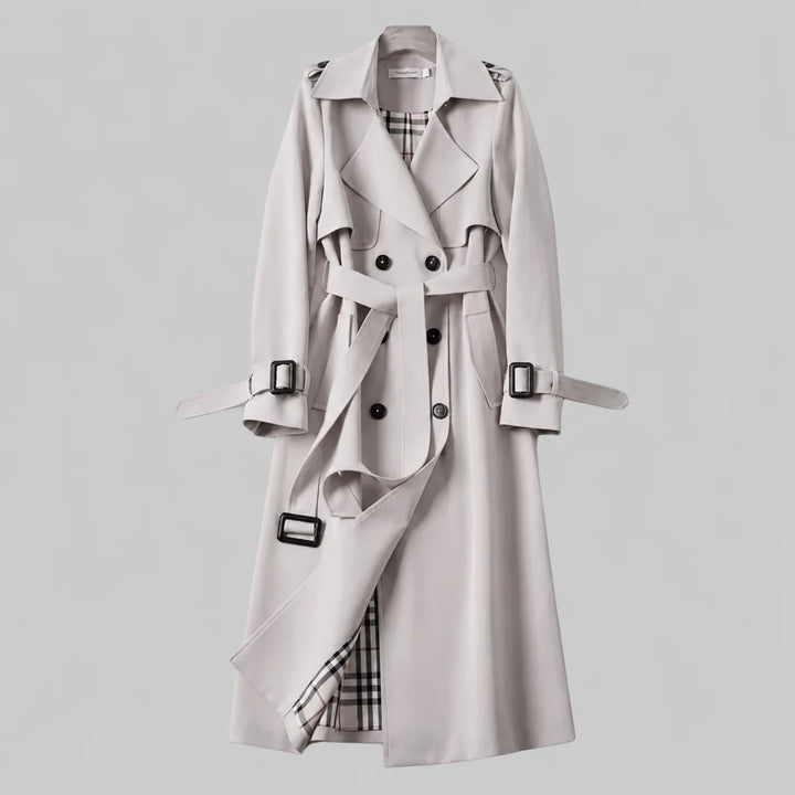 Women's beige double-breasted trench coat, a stylish belted outerwear piece with a classic long design.