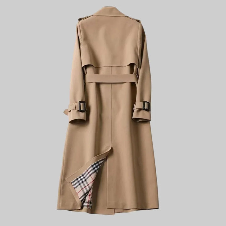 Classic women's beige double-breasted trench coat, a versatile long jacket for everyday elegant style & comfort.