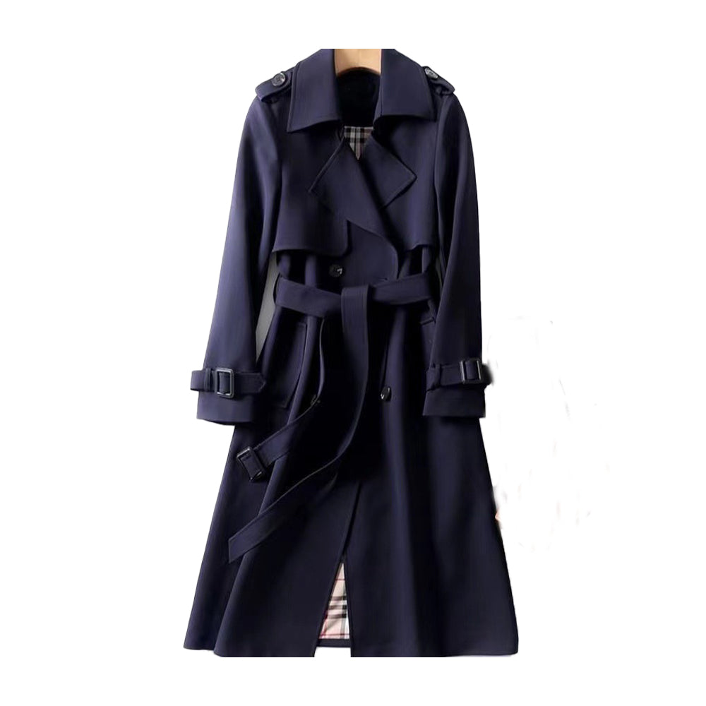 Versatile women's trench coat with belt, double-breasted. Essential fall fashion outerwear for a sophisticated look.