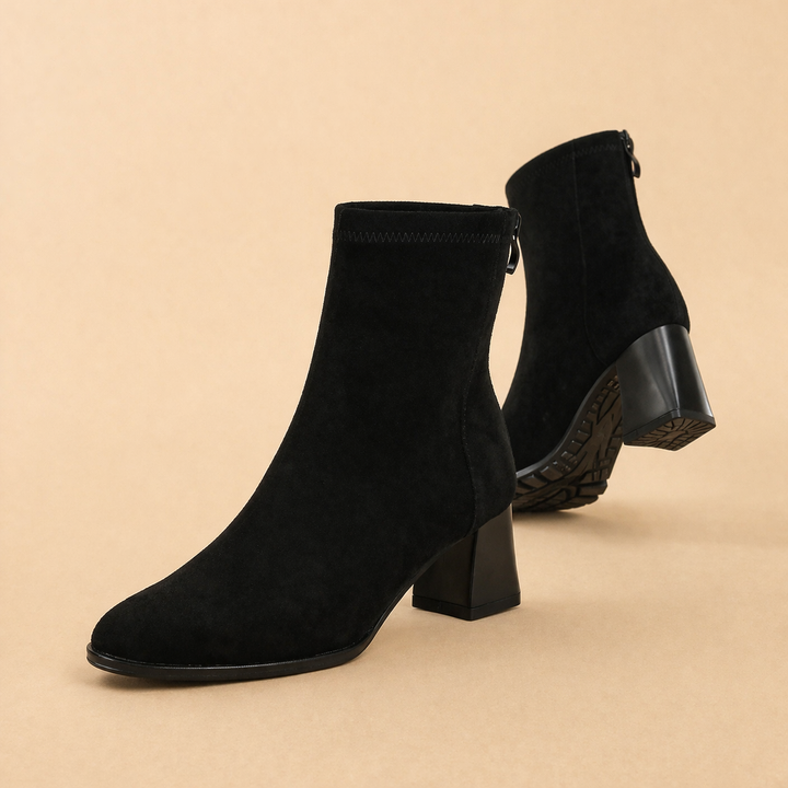 Classic women's ankle boots in premium material, offering comfort & timeless style for any occasion.