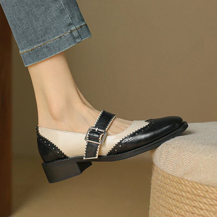 Vintage-style brown leather Mary Jane flats for women, featuring a durable design and secure buckle strap.