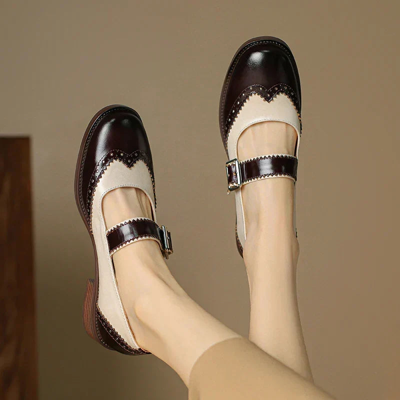 Comfortable black leather Mary Janes for women, featuring a timeless design and adjustable buckle strap.