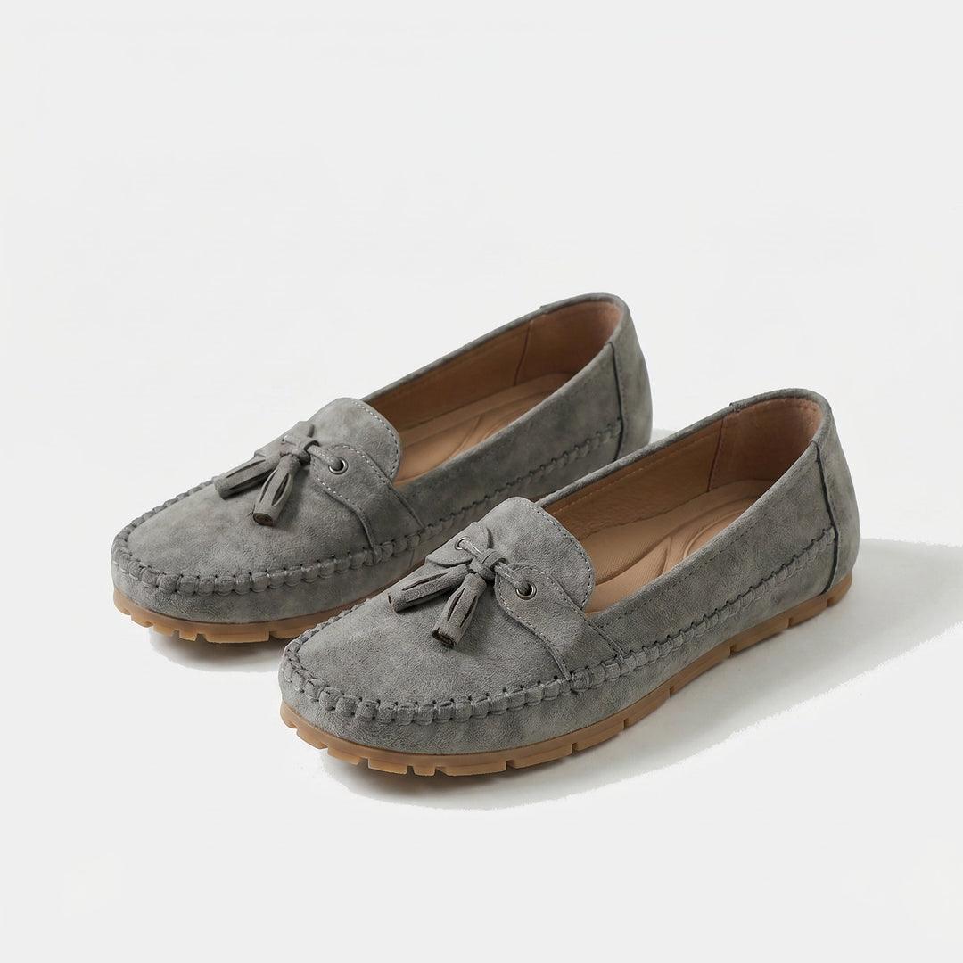 Professional women's tassel loafers. Classic slip-on work shoes offering elegant comfort for busy everyday wear.