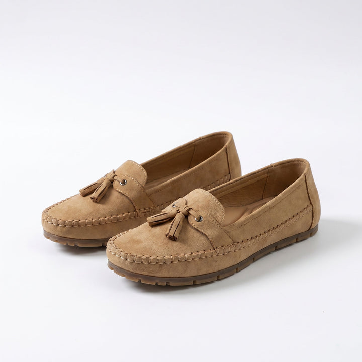 Stylish women's black tassel loafers. Classic slip-on design for elegant, comfortable, everyday women's fashion.