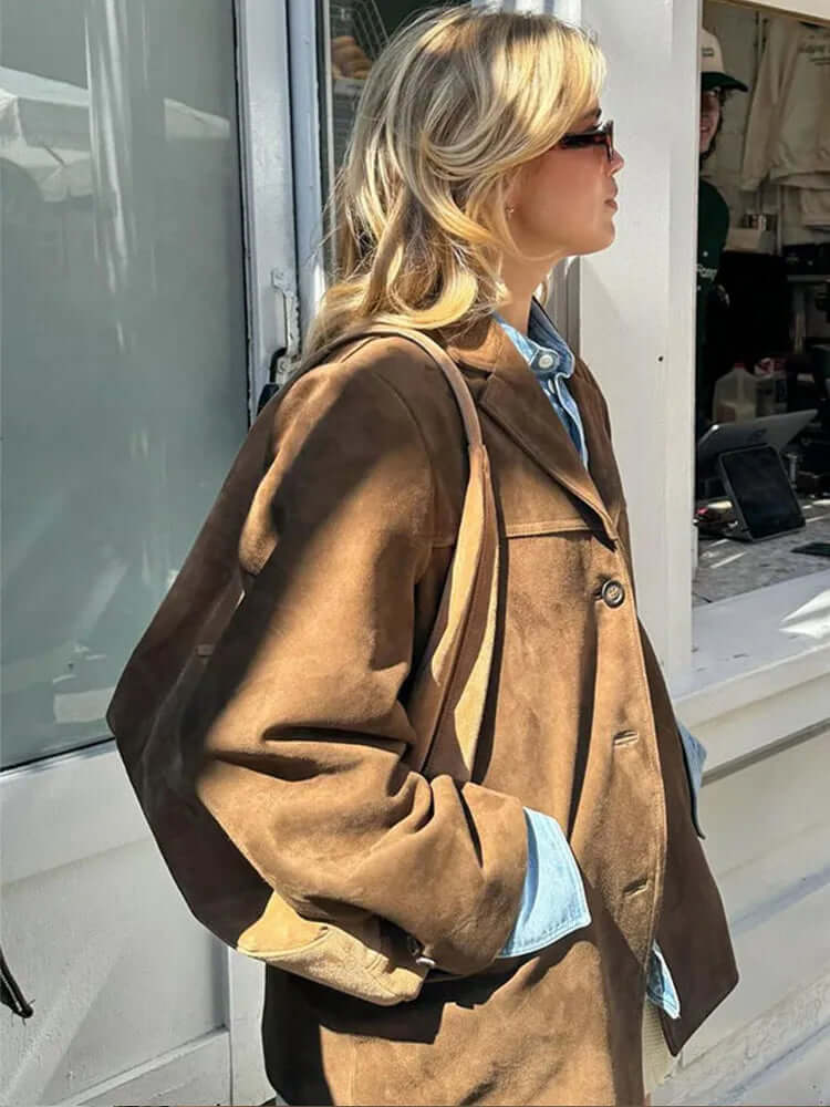 Stylish ladies brown jacket, classic and versatile for any occasion. Perfect timeless outerwear for women.