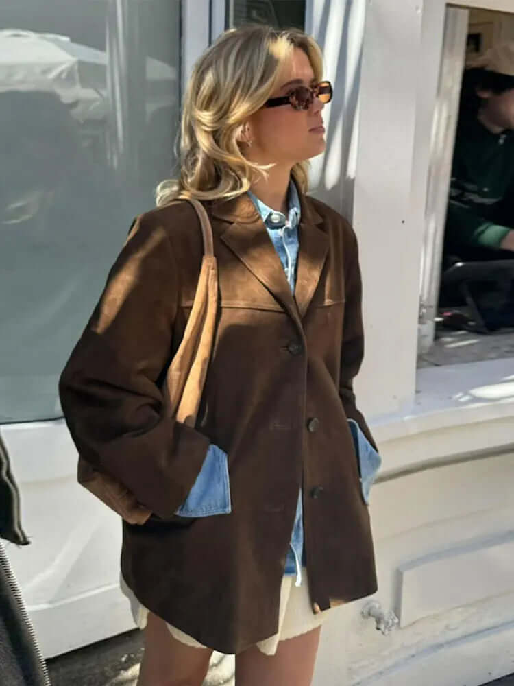 Chic women's brown jacket, fitted for a flattering silhouette. Everyday wear classic style with zipper detail.