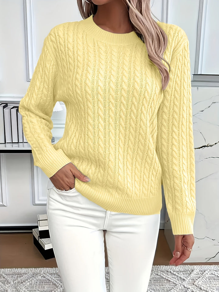 Soft and warm cable knit women's jumper. Cozy knitted pullover, perfect for comfortable winter fashion.