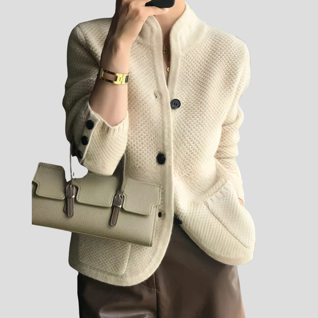 Women's classic cashmere v-neck cardigan with button front, a cozy neutral fashion essential.
