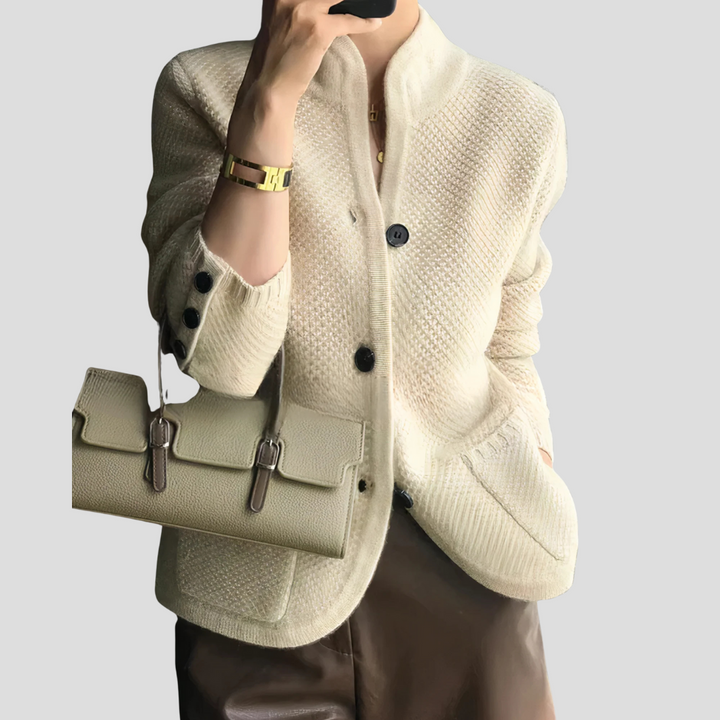 Women's classic cashmere v-neck cardigan with button front, a cozy neutral fashion essential.