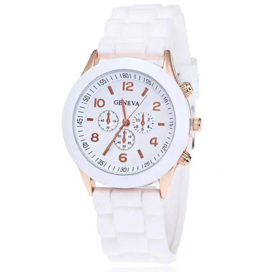 Precision women's quartz watch with a soft pink silicone strap and easy-to-read classic dial.