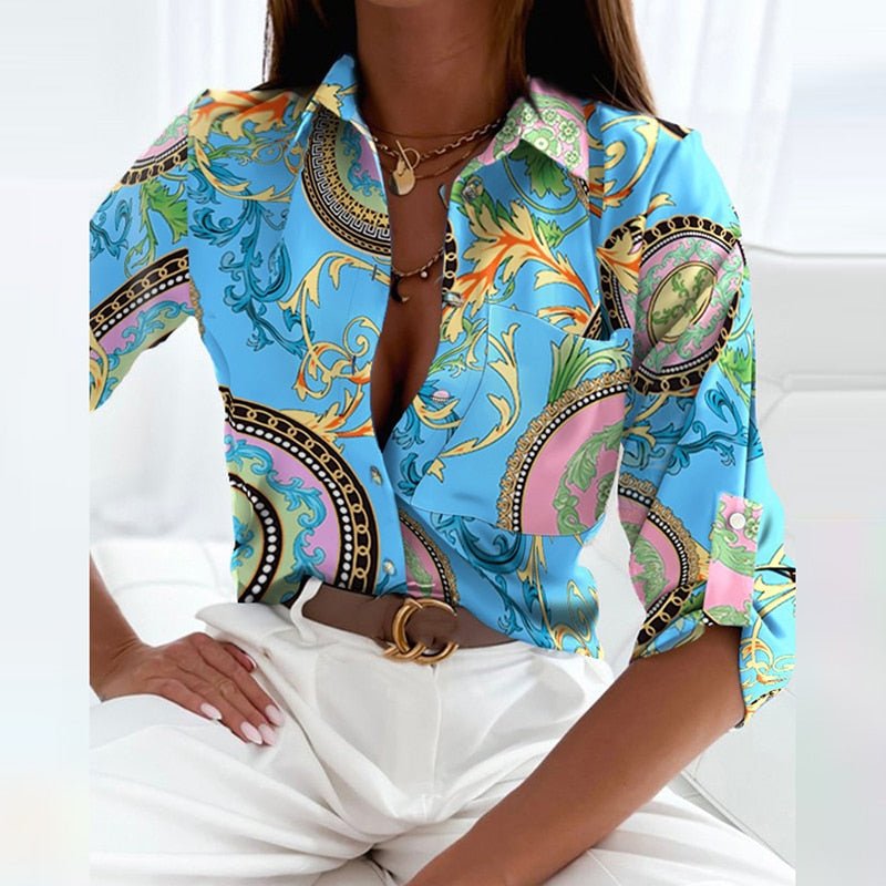 Fabric texture close-up of a women's printed blouse. Emphasizes quality, comfortable feel & versatile fashion.