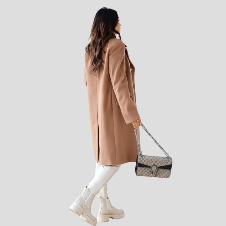 Women's fashionable double-breasted trench coat, ideal for elegant fall outerwear.